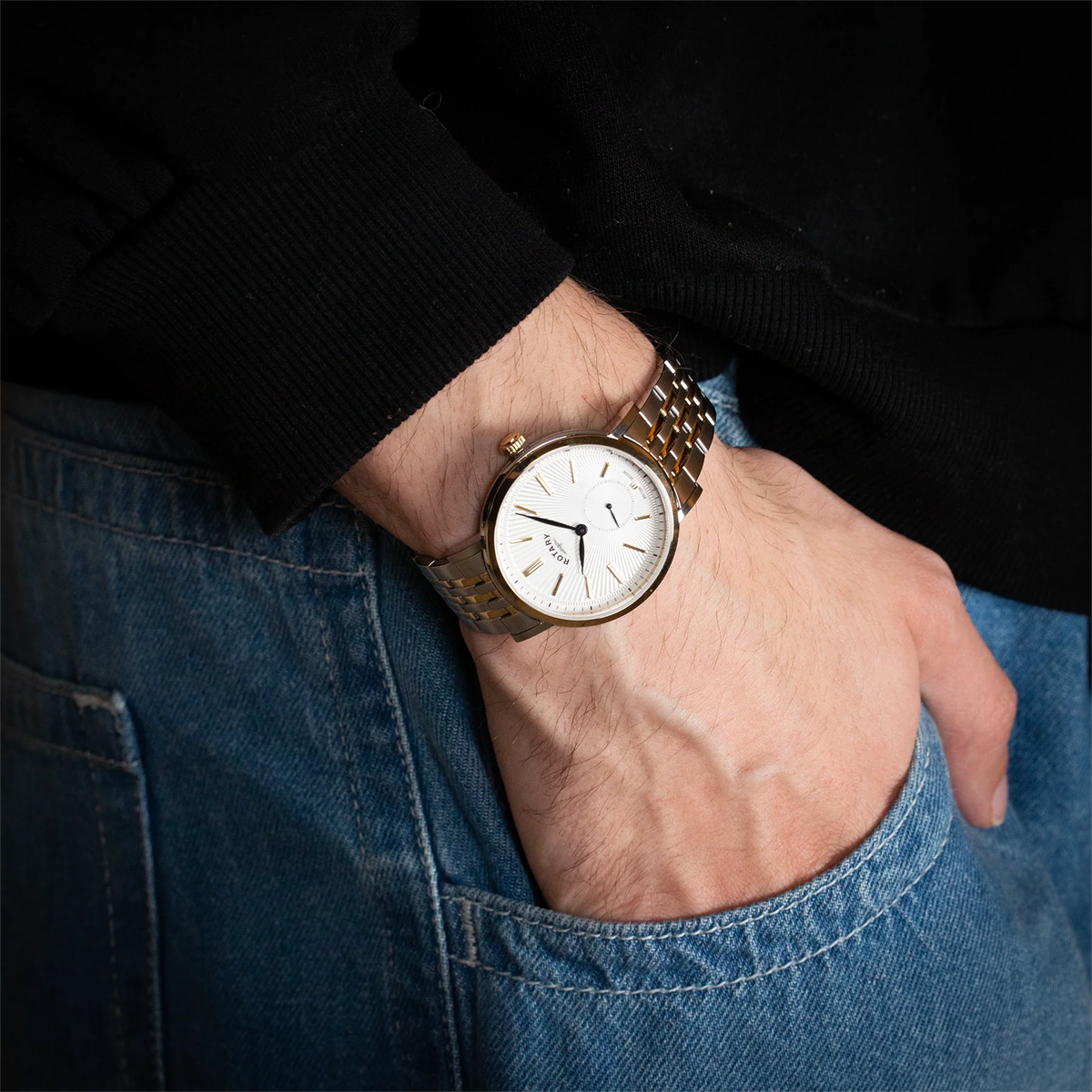 Model wears Rotary Dress Small Seconds Watch, White Dial with Two Tone Stainless Steel Bracelet - GB05321/29