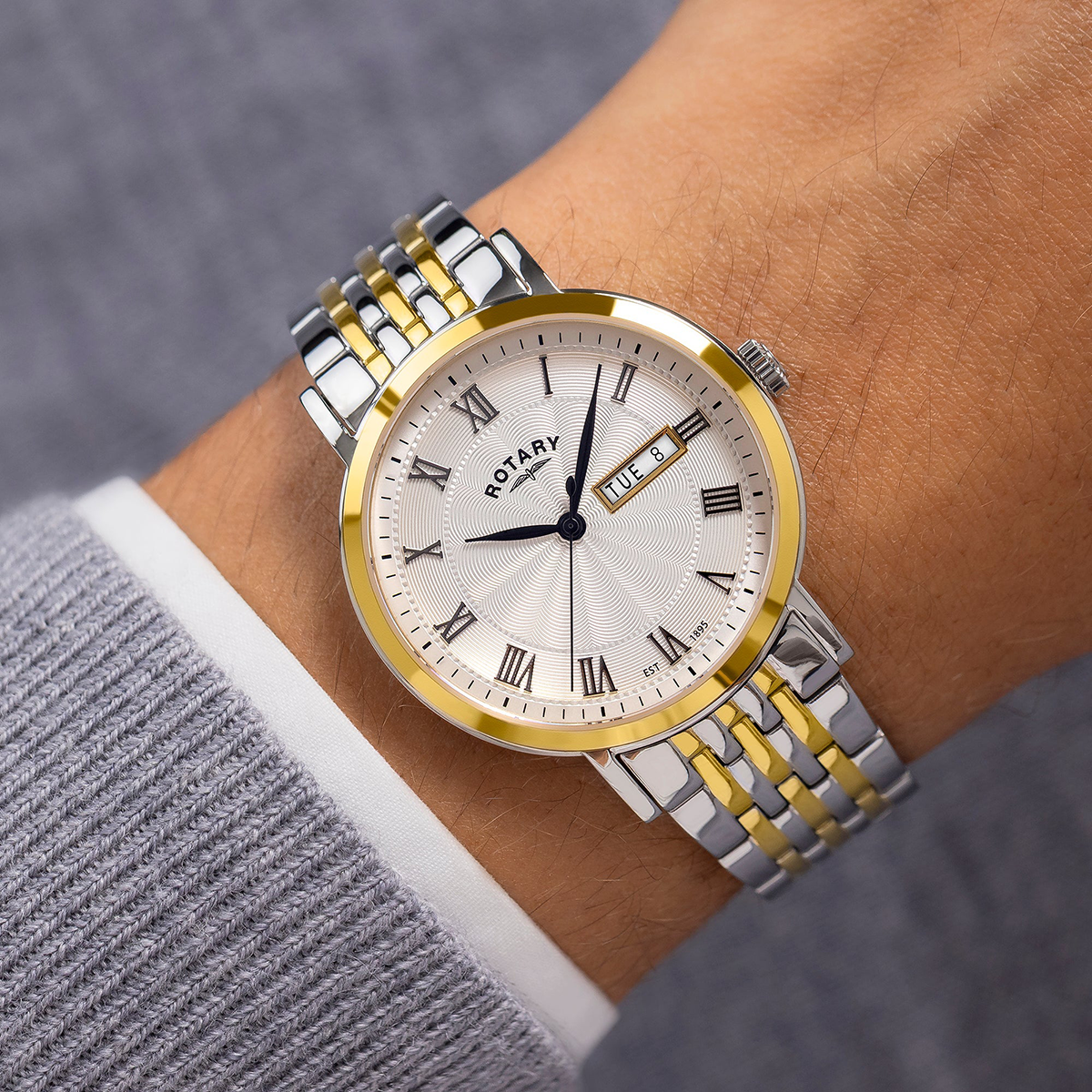 Model wears Rotary Heritage 2-Tone, White Dial with Stainless Steel Bracelet GB05421/01