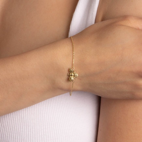 Model wears 9ct Yellow Gold Bee Bracelet