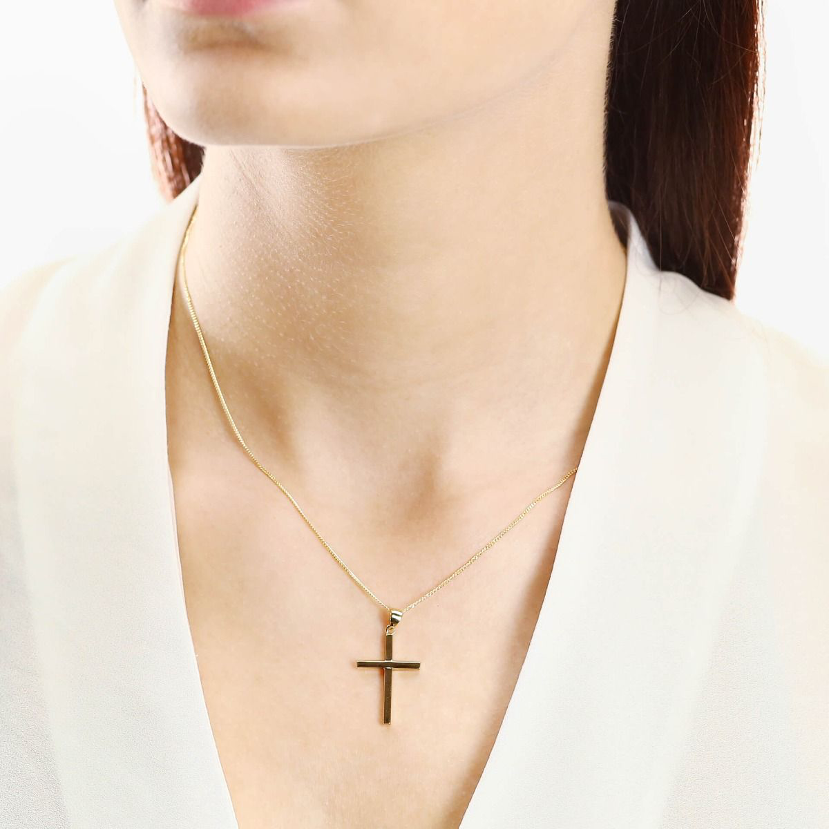 Model wears 9ct Yellow Gold Large Cross Pendant