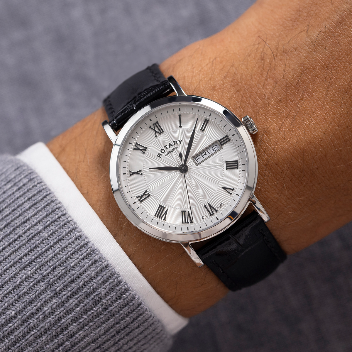 Model wears Rotary Heritage Stainless Steel Watch, White Dial with Black Leather Strap - GS05420/01