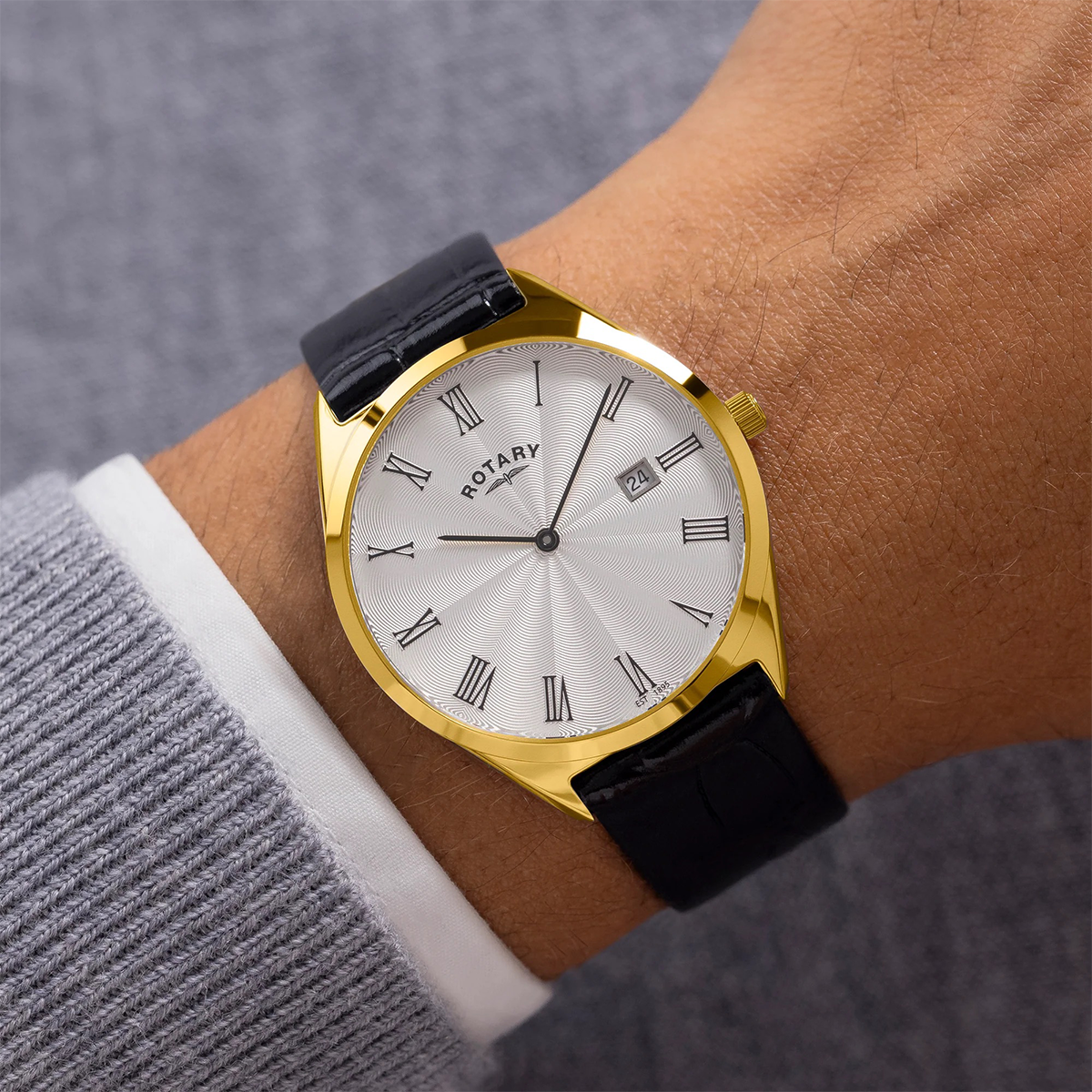 Model wears Rotary Ultra Slim Watch, White Dial with Black Leather Strap & Gold Plated Case - GS08013/01
