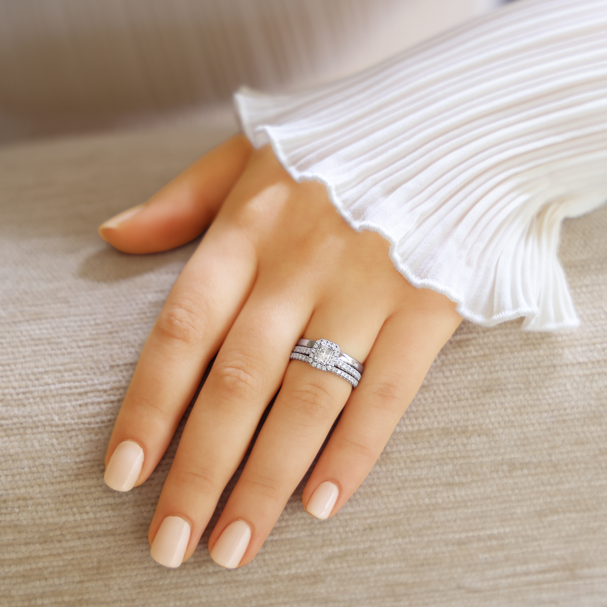 Model Wears Platinum Radiant Shaped Diamond Halo & Shoulder 0.69ctw Ring with Matching Eternity & Wedding Band