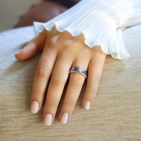 Model wears Platinum Pear Cut Diamond Solitaire 0.72ct Ring With Matching Eternity & Wedding Band