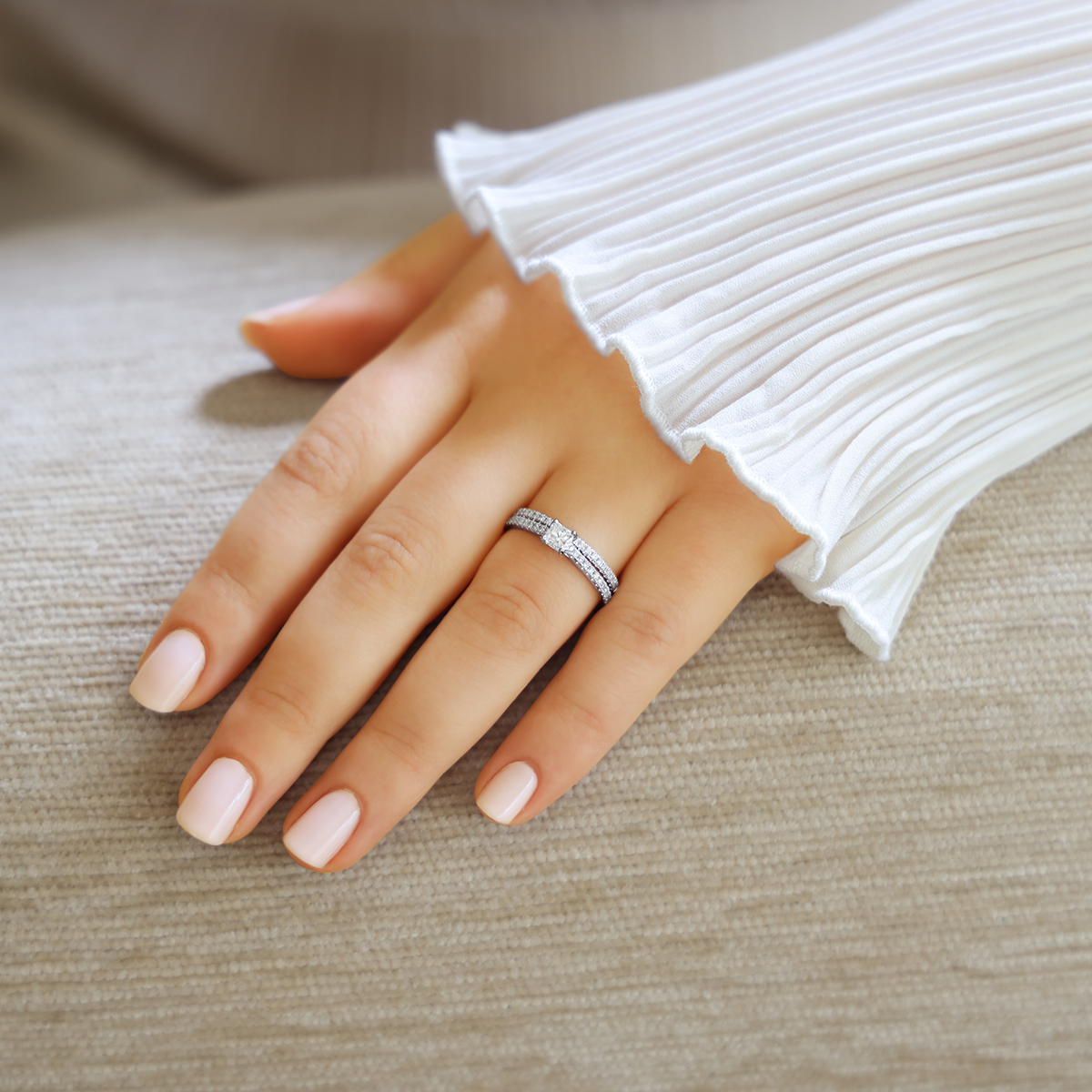 Model wears Platinum Princess Shaped Diamond Solitaire & Shoulder 0.49ctw Ring with Matching Eternity Ring