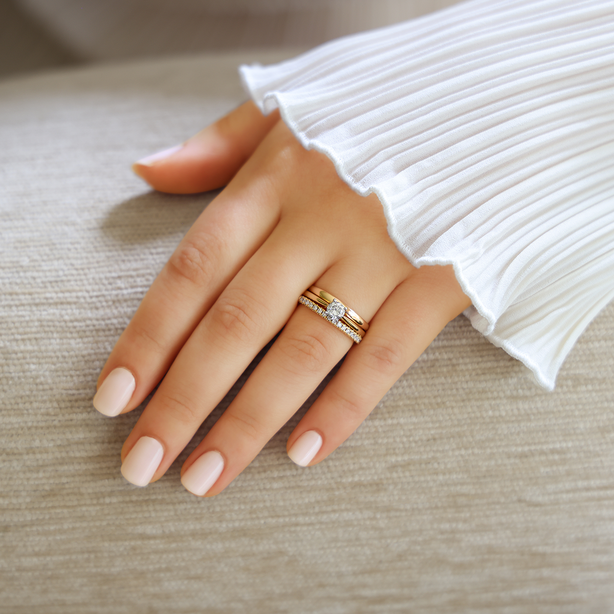 Model wears 18ct Two Colour Gold Round Brilliant Cut Diamond Solitaire 0.50ct Ring with Eternity & Wedding Band