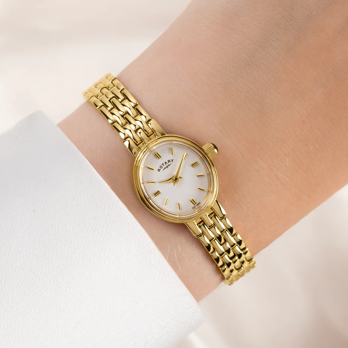 Model wears Rotary Cocktail, White Dial with Gold Plated Bracelet LB02084/02