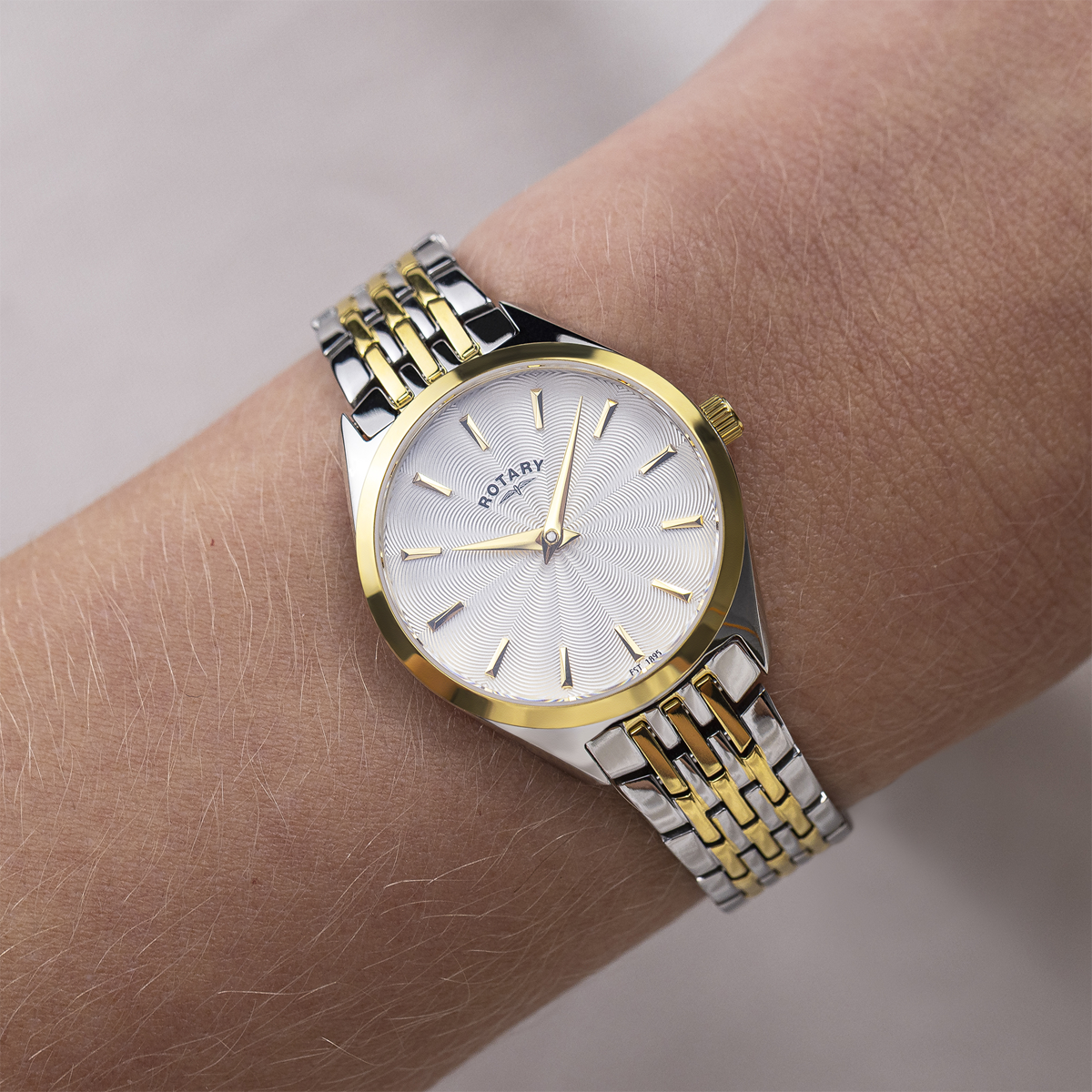 Model wears Rotary Ultra Slim 2-Tone, Silver Dial with Stainless Steel Bracelet - LB08011/02