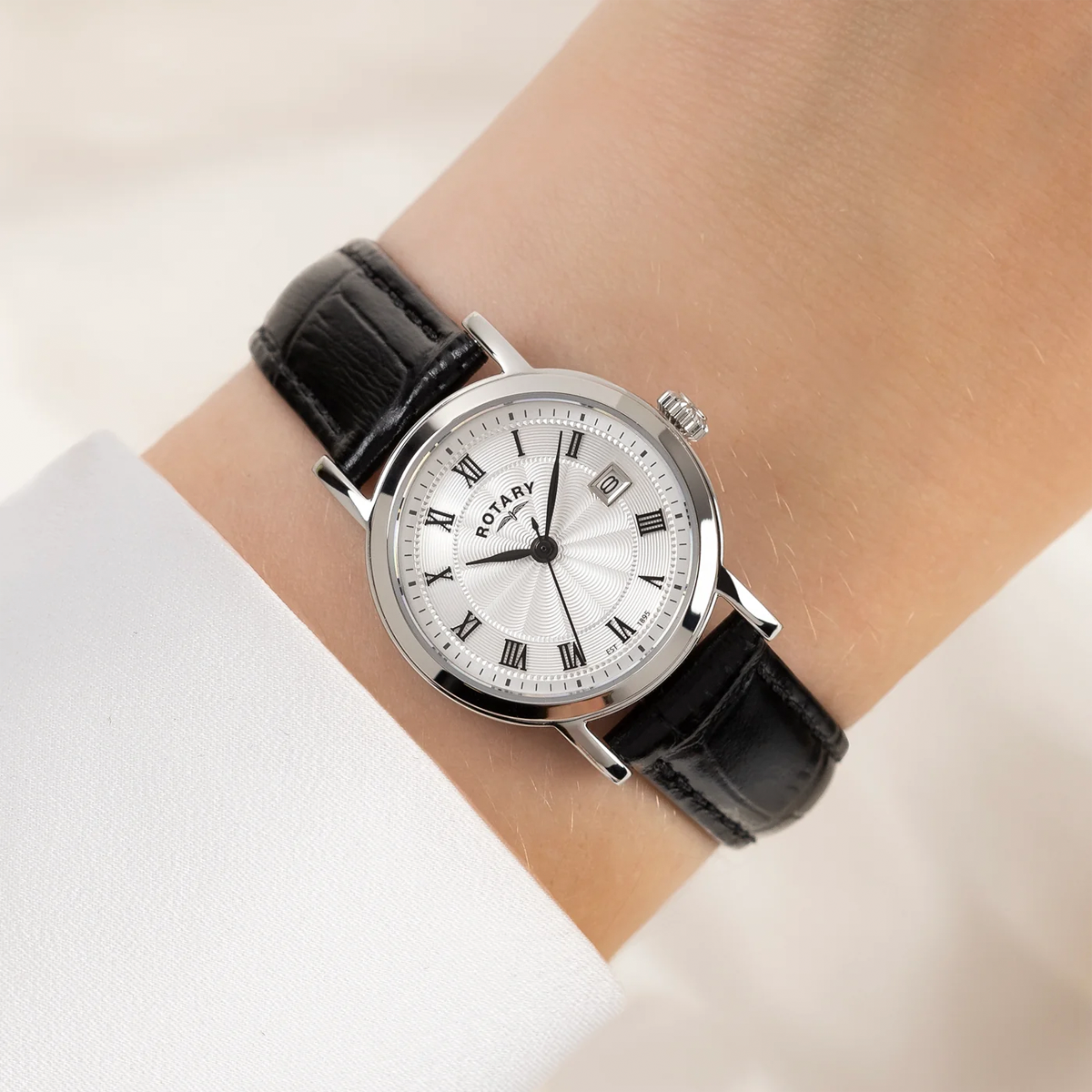 Model wears Rotary Heritage Ladies Stainless Steel Watch, White Dial with Black Leather Strap - LS05420/01