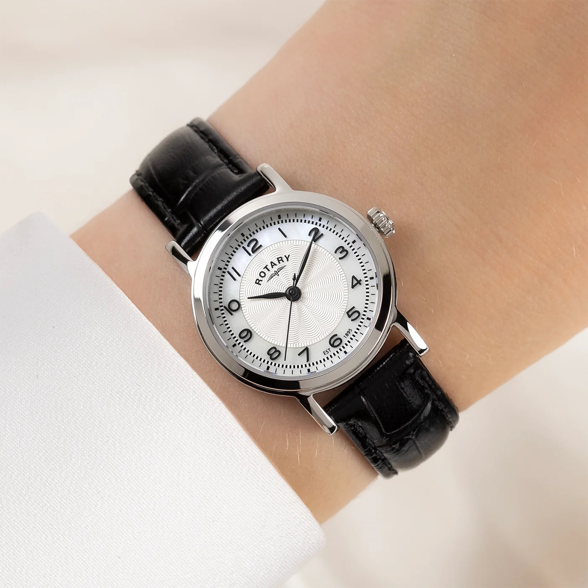 Model wears Heritage Watch, Mother of Pearl Dial with Black Leather Strap LS05420/68