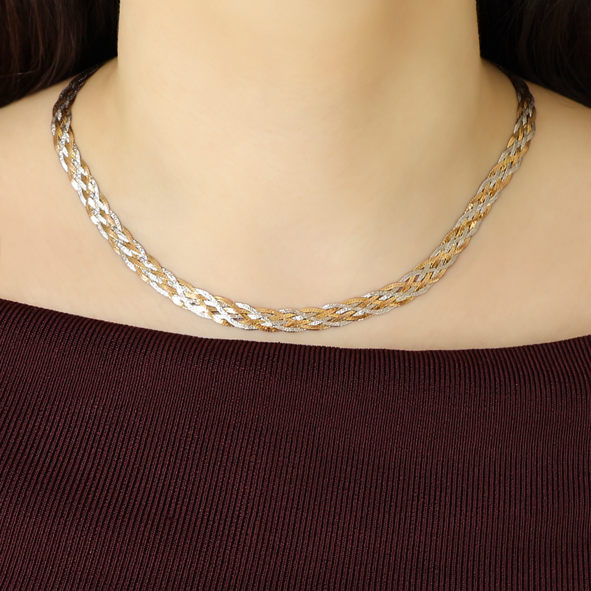 Model wears 9ct Three Colour Gold Six Plait Herringbone Necklace