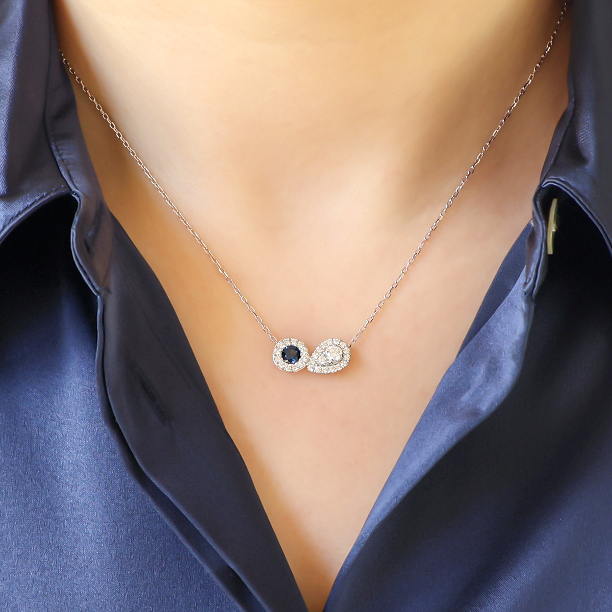 Model wears 9ct White Gold Sapphire & Diamond Toi-et-Moi Cluster Necklace