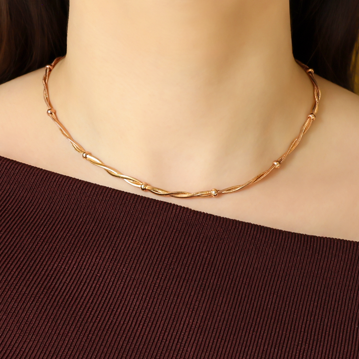 Model wears 9ct Yellow Gold Beaded Omega Twist Necklace