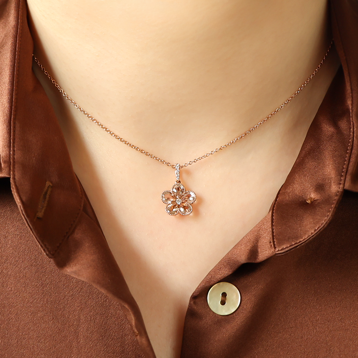 Model wears 18ct Rose Gold Morganite & Diamond Flower Pendant & Chain