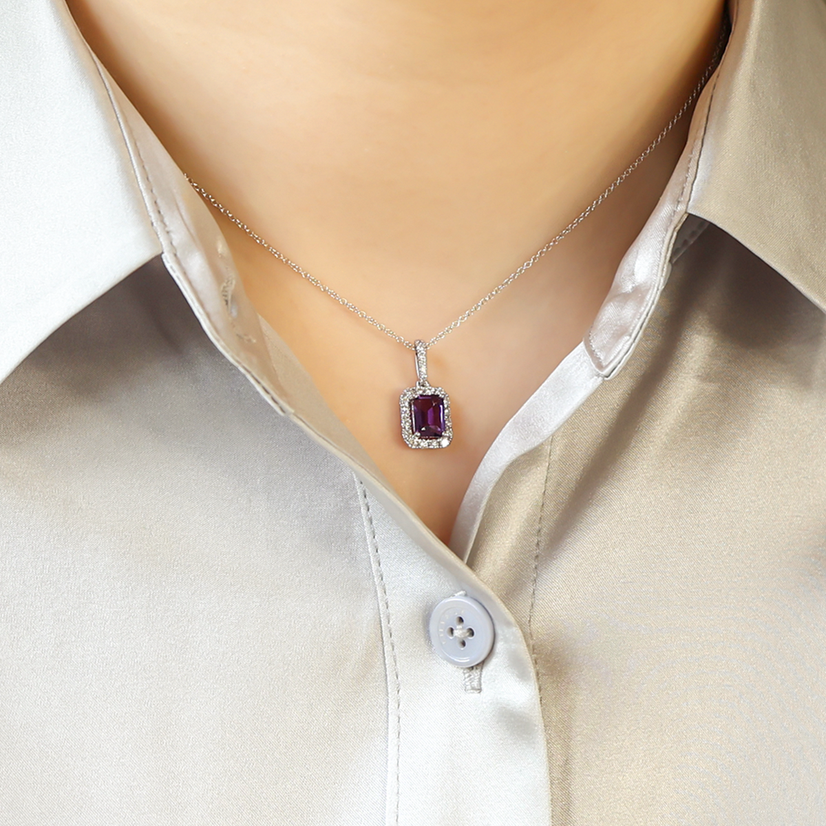 Model wears 18ct White Gold Octagonal Amethyst & Diamond Halo Pendant & Chain