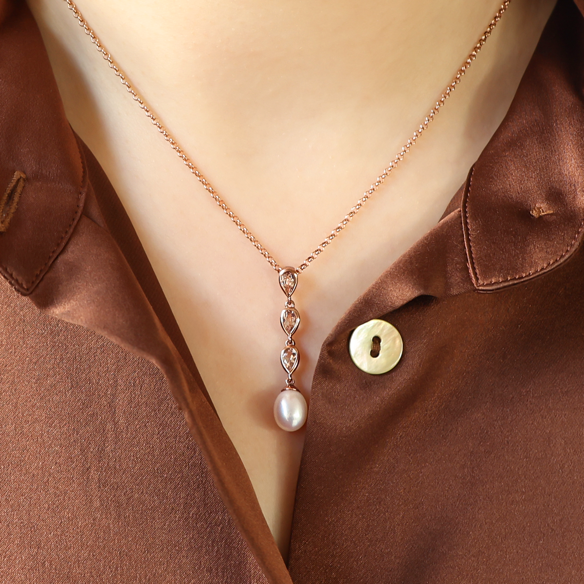Model wears 9ct Rose Gold Pearl & Morganite Triple Drop Pendant & Chain