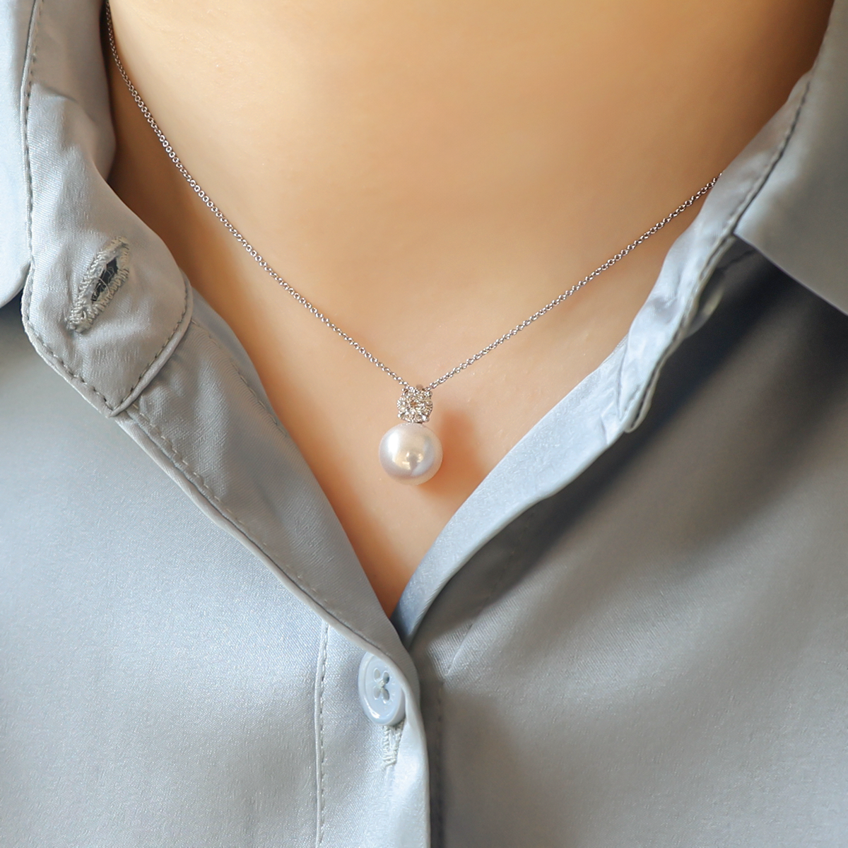 Model wears 9ct White Gold Cultured Freshwater Pearl & Diamond Pendant With Chain