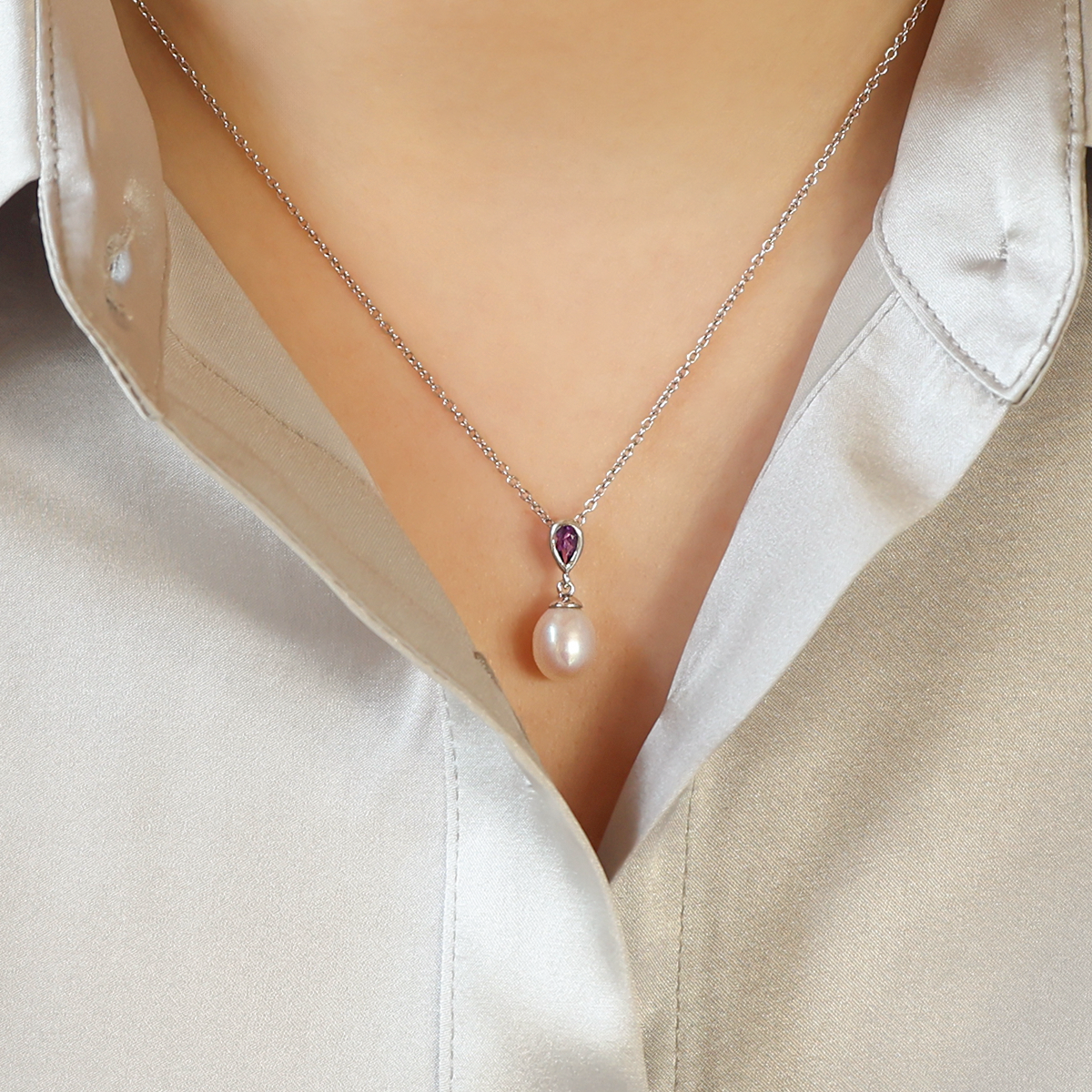 Model wears 9ct White Gold Pearl & Amethyst Drop Pendant & Chain