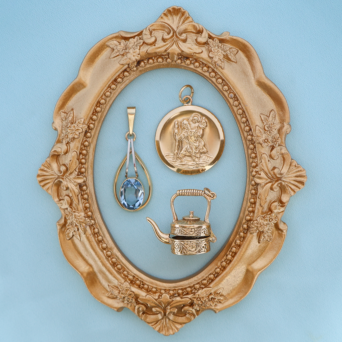 9ct Yellow Gold Synthetic Blue Spinel Teardrop Pendant, 9ct Yellow Gold St Christopher Pendant By Georg Jensen & 9ct Yellow Gold Tea Pot Opening Charm