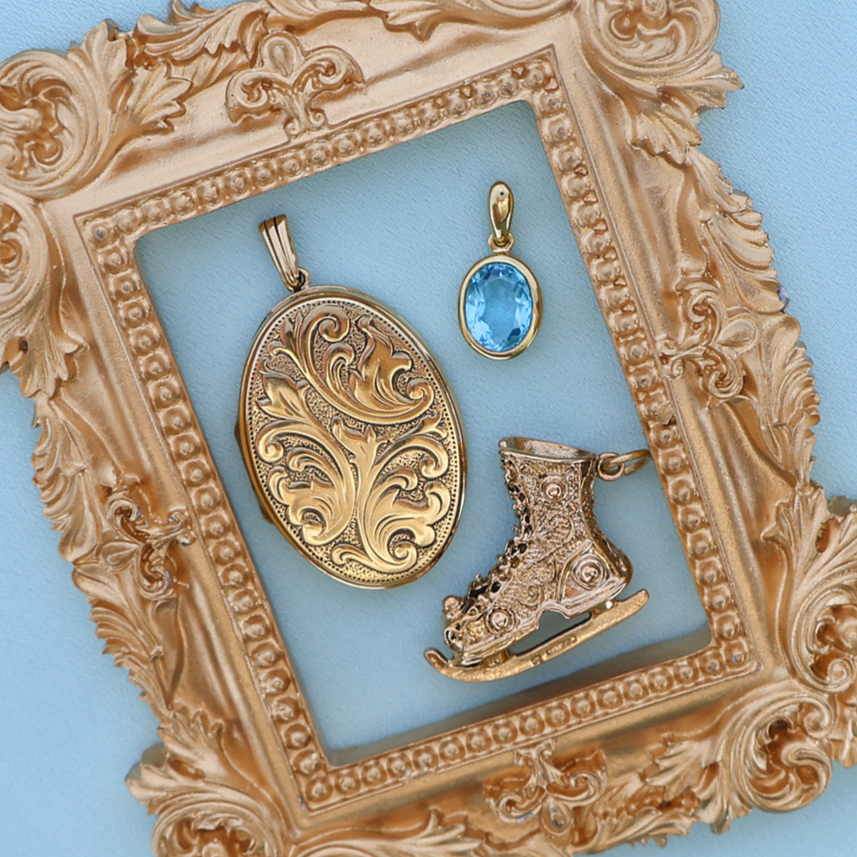 9ct Yellow Gold Oval Shaped Foliate Scroll Locket By Georg Jensen, 9ct Yellow Gold Oval Shaped Swiss Blue Topaz Bezel Set Pendant, 9ct Yellow Gold Ice Skating Boot Charm