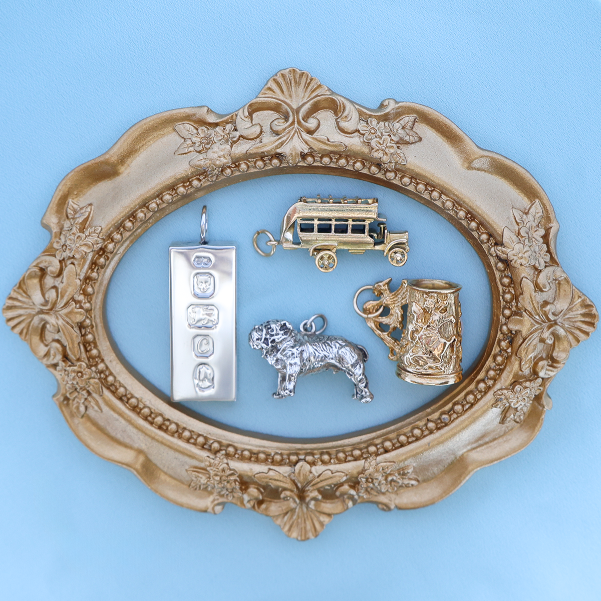 Sterling Silver Heavy Rectangular Ingot Pendant, 9ct Yellow Gold Open Topped Tour Bus Charm By Georg Jensen, Sterling Silver Bulldog Charm, 9ct Yellow Gold St. George Tankard Charm