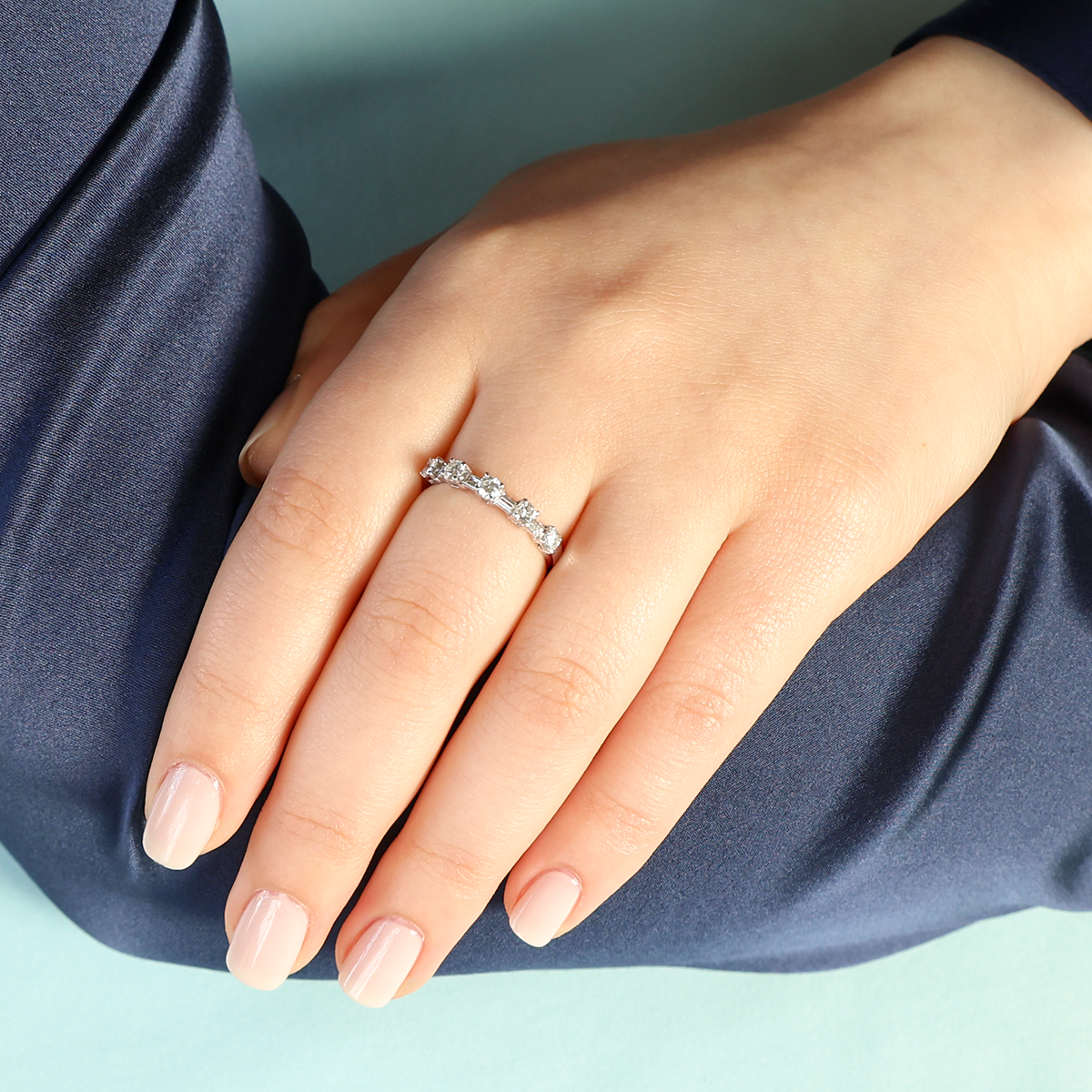 Model wears 18ct White Gold Round & Baguette Cut 0.70cts Diamond Eternity Ring