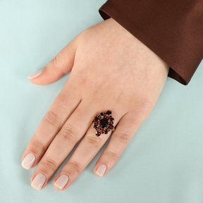 Model wears 9ct Yellow Gold Garnet Marquise Shaped Cluster Ring