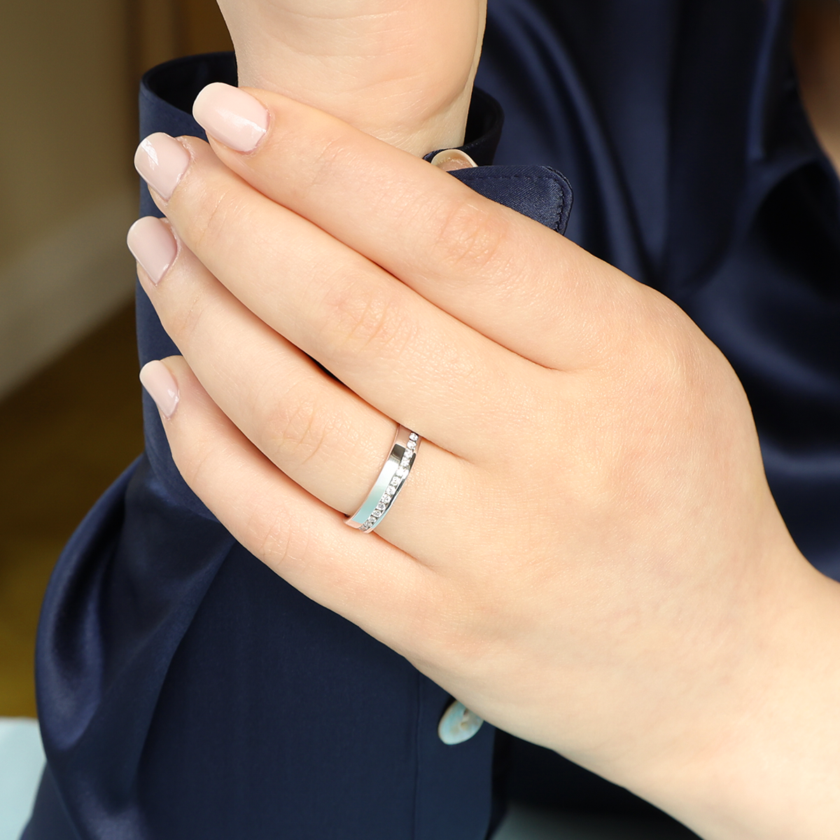 Model wears 18ct White Gold 0.25cts Round Brilliant Cut Diamond Band