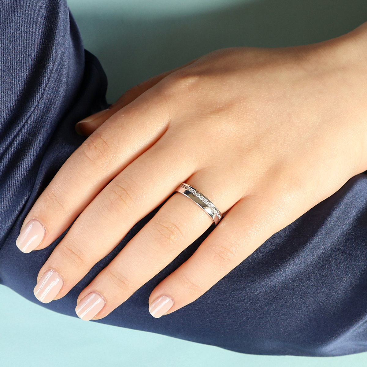 Model wears 18ct White Gold 0.25cts Round Brilliant Cut Diamond Band