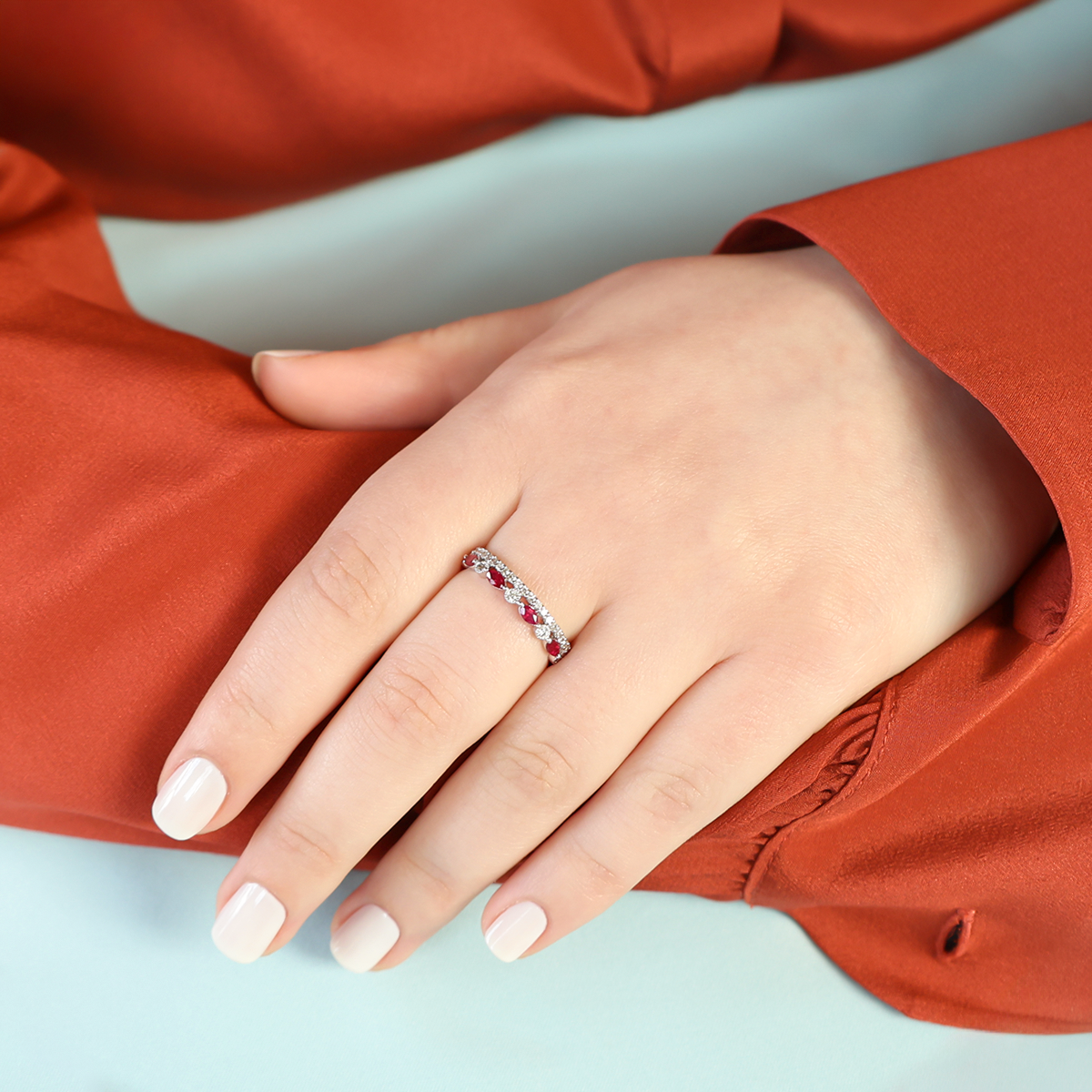 Model wears 9ct White Gold Marquise Shaped Ruby & Diamond Ring