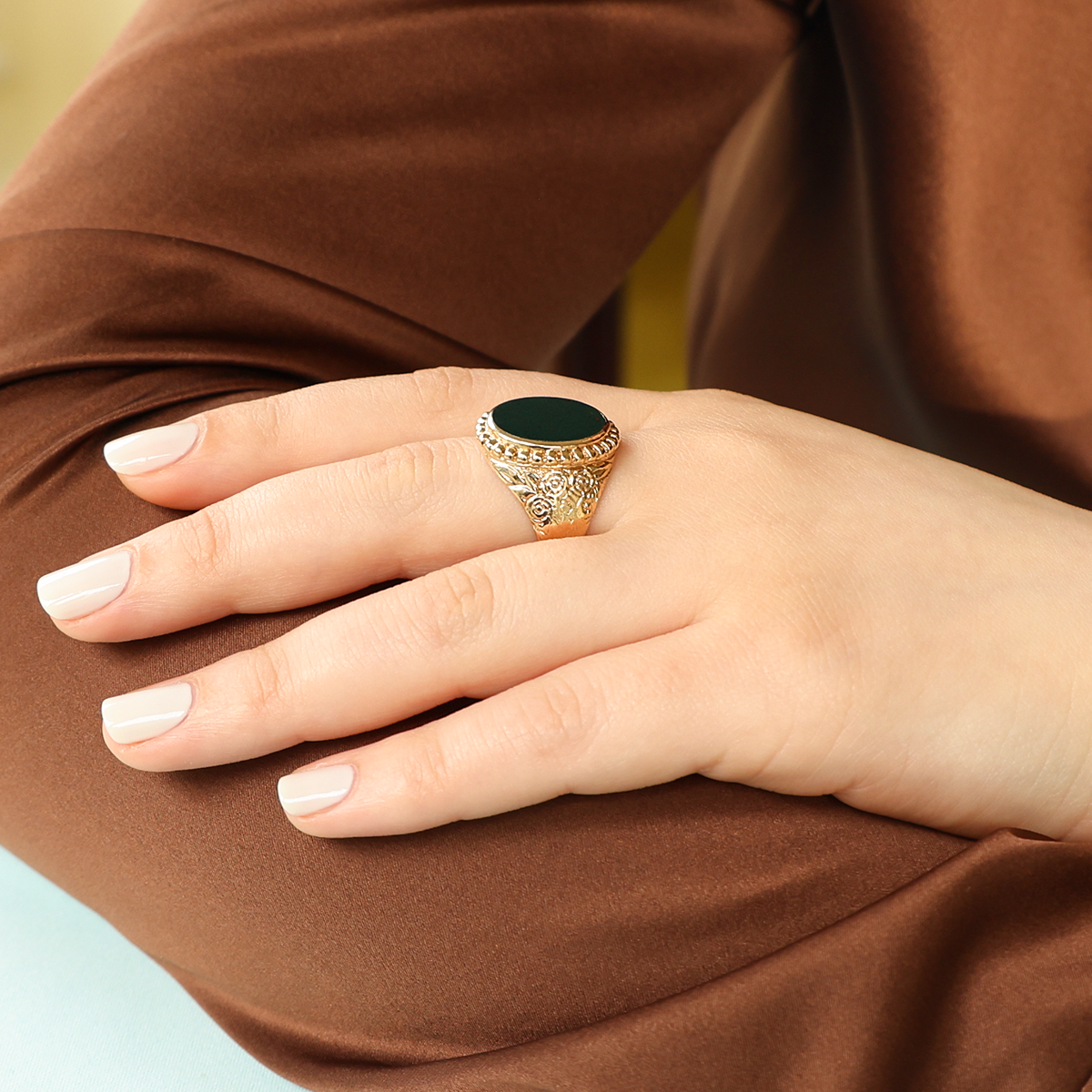 Model wears 9ct Yellow Gold Oval Shaped Bloodstone Engraved Signet Ring