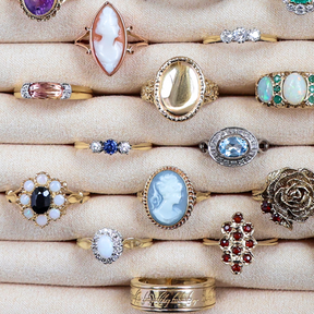 A selection of Estate, Vintage or Antique gold rings set with precious gemstones and crafted with intricate motifs. 