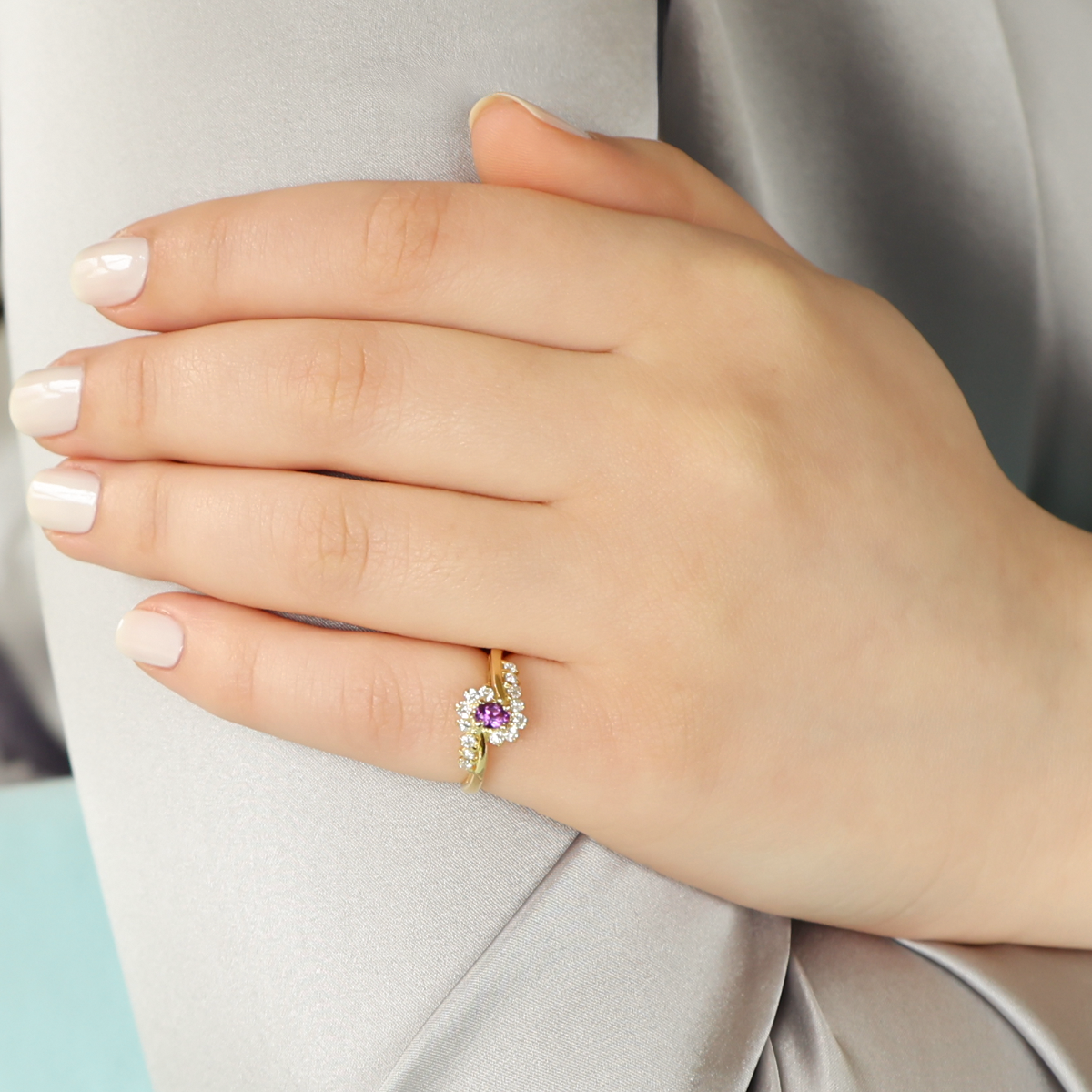 Model wears 18ct Yellow Gold Amethyst & Diamond Twist Ring