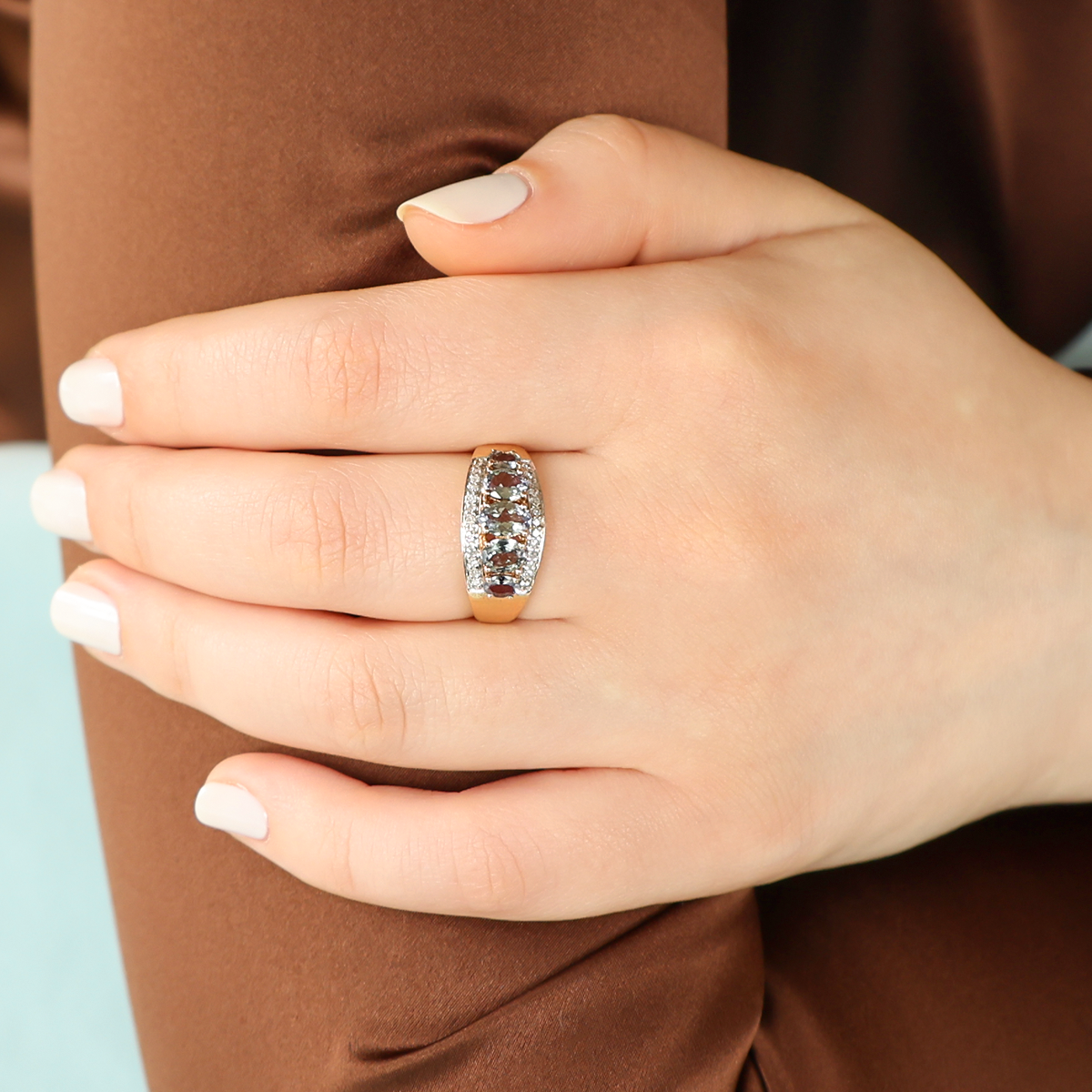 Model wears 9ct Yellow Gold Bi Colour Tanzanite & Diamond Ring