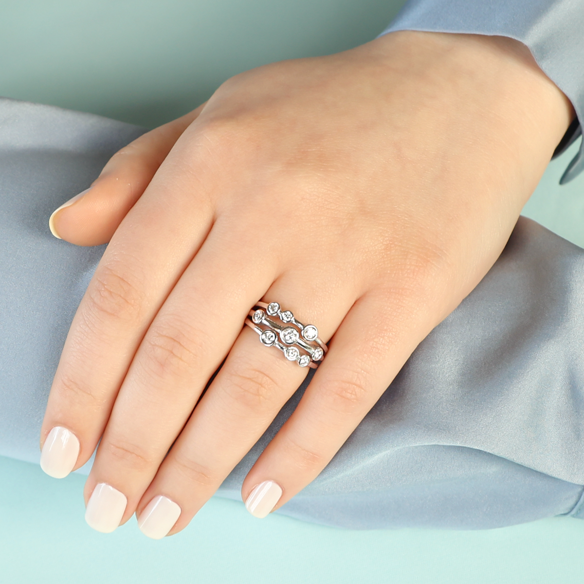 Model wears Platinum Three Strand 0.49ct Diamond Bubble Ring