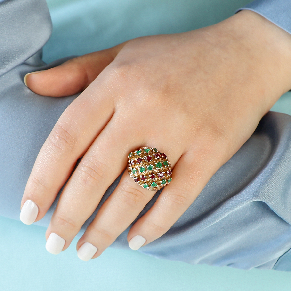 Model wears 9ct Yellow Gold Emerald & Ruby Bombé Ring