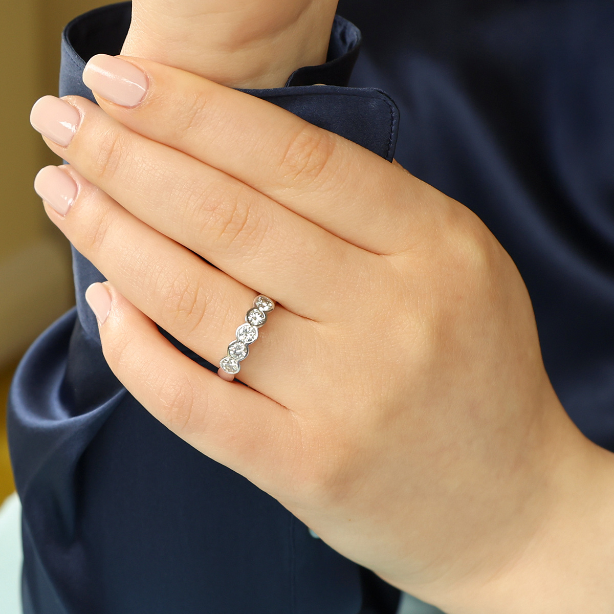 Model wears 18ct White Gold Round Brilliant Cut 0.86cts Diamond Bezel Set Five Stone Ring