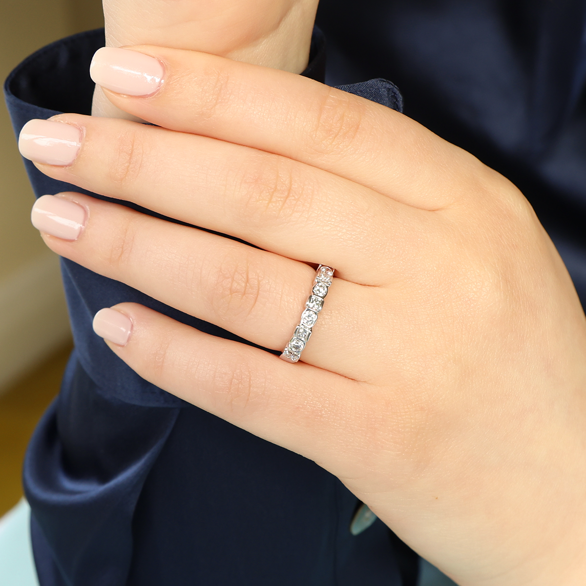 Model wears 18ct White Gold Princess & Round Brilliant Cut 0.70ctw Diamond Eternity Ring