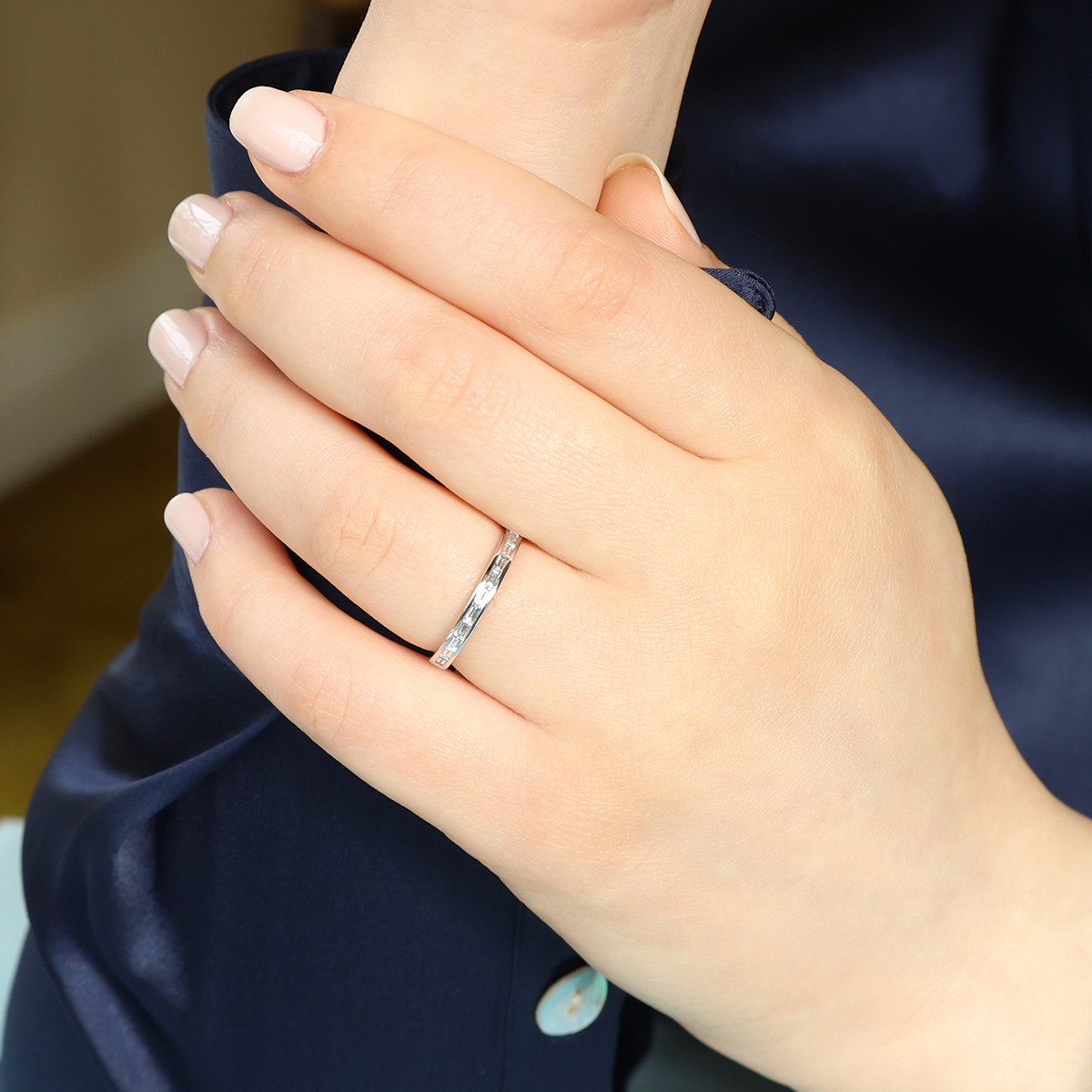 Model wears 18ct White Gold Baguette Cut Certified 0.30cts Diamond Channel Set Band