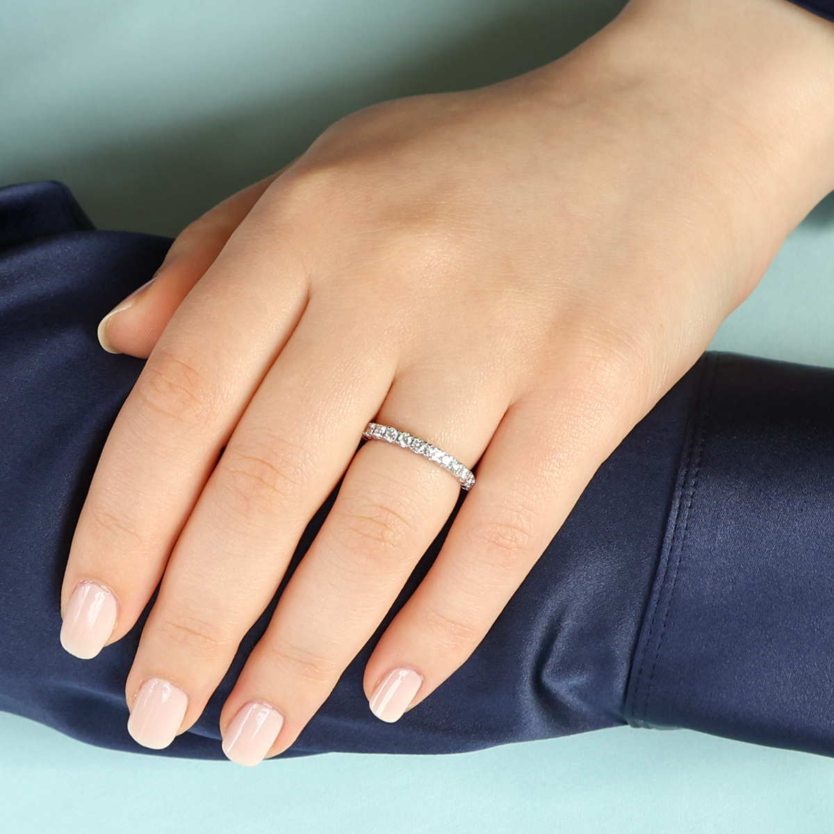 Model wears 18ct White Gold Round Brilliant Cut Certified 0.50cts Diamond Set Band