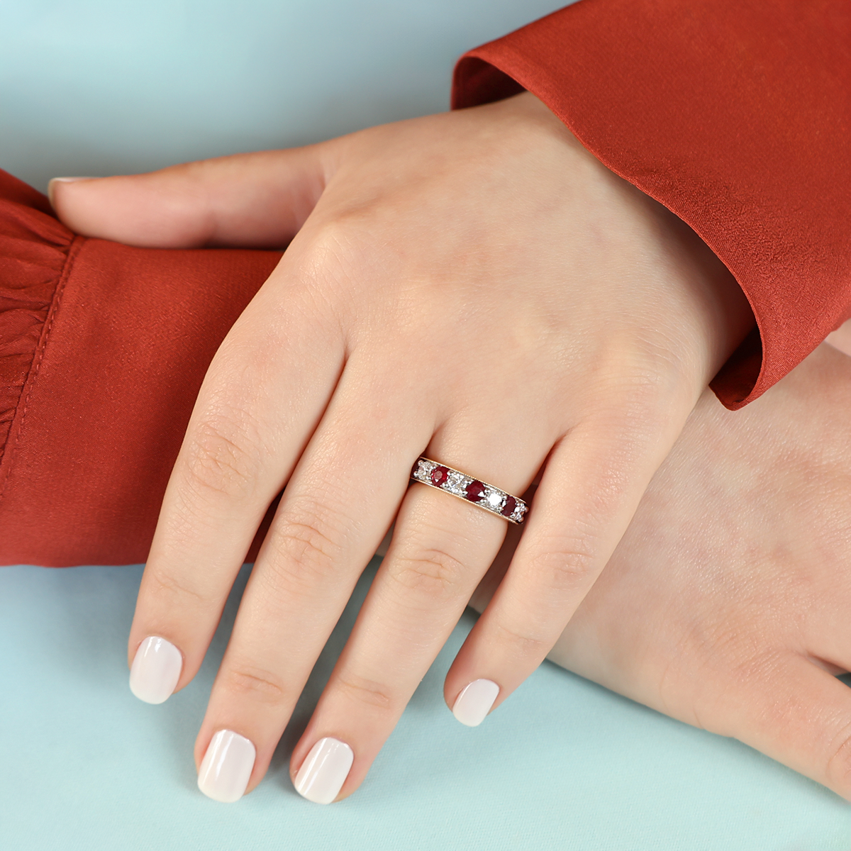 Model wears 18ct Yellow Gold Ruby & 0.82cts Diamond Mille-Grain Set Eternity Ring