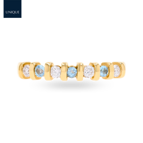 9ct Yellow Gold Blue Topaz & 0.23cts Diamond Bar Set Eternity Ring