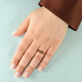 Model wears 18ct Yellow Gold Garnet & Diamond Five Stone Victorian Ring