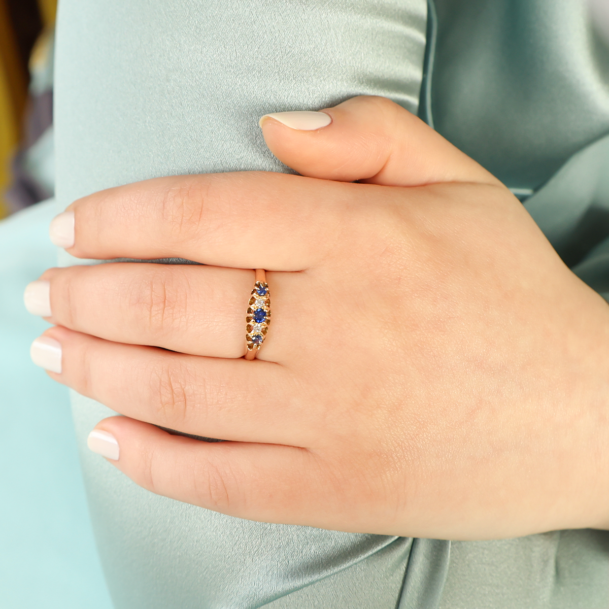 Model wears 18ct Yellow Gold Sapphire & Diamond Five Stone Antique Ring