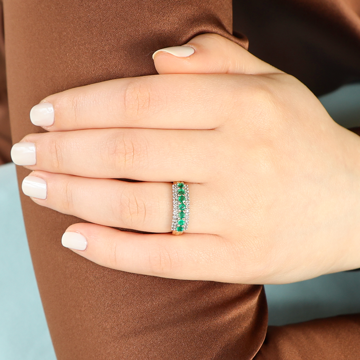 Model wears 9ct Yellow Gold Emerald & Diamond Triple Row Ring