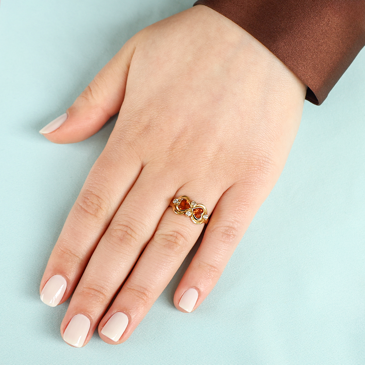 Model wears 18ct Yellow Gold Citrine & Diamond Bow Ring