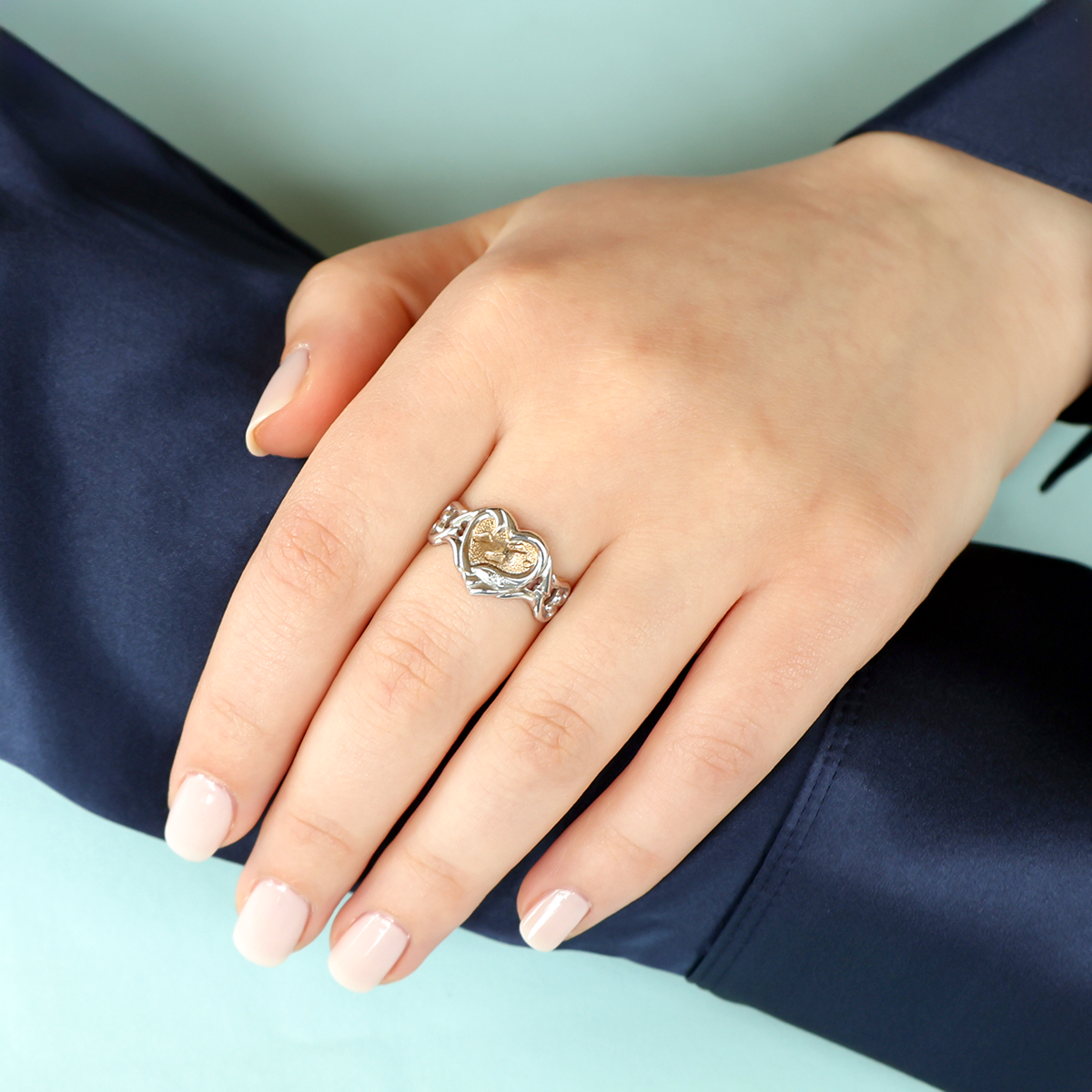Model wears 9ct Yellow & White Gold Footprint In The Sand Diamond Ring