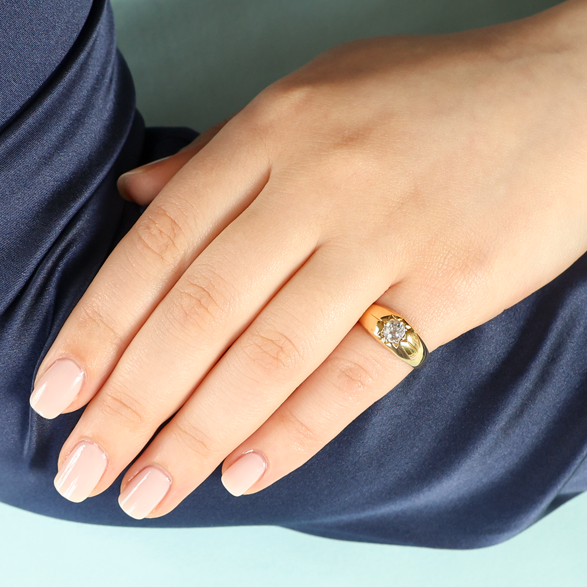 Model wears 18ct Yellow Gold Old Cut Diamond Star Set Solitaire Ring