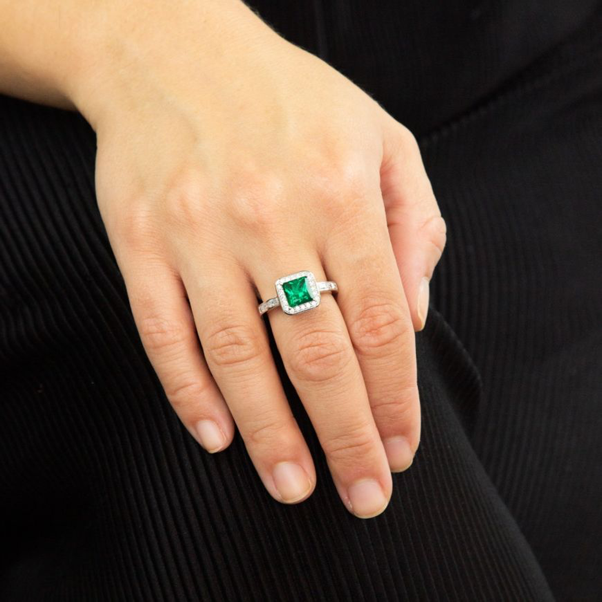 Model wears Sterling Silver Art Deco Stye Green Cubic Zirconia Pave Set Ring