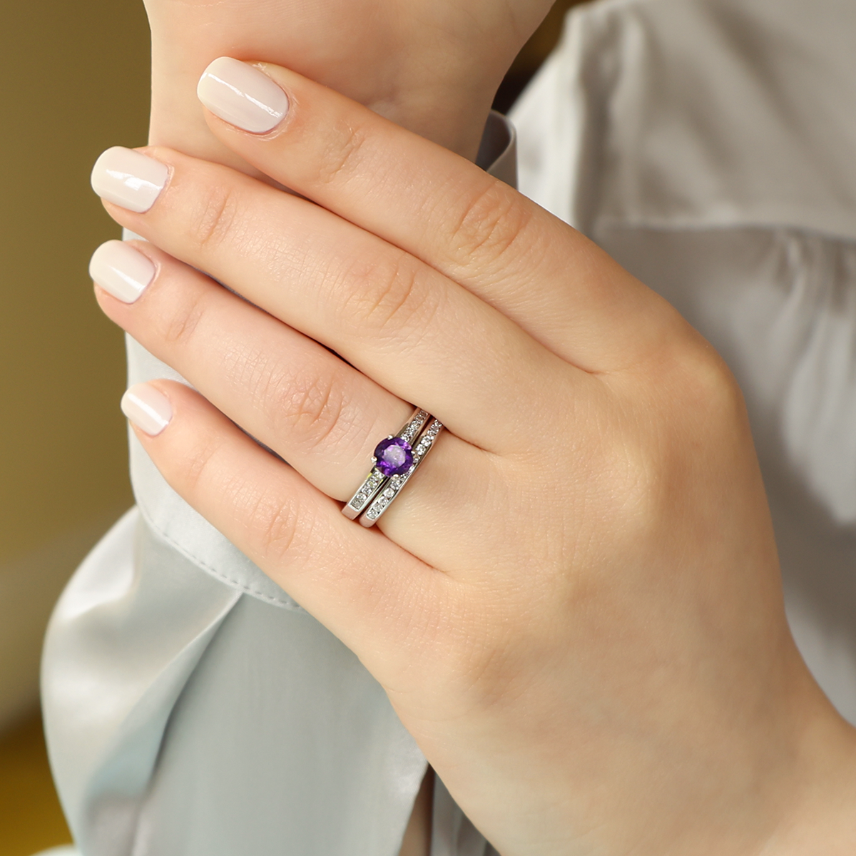 Model wears 18ct White Gold Amethyst & Diamond Channel Set Shoulders Solitaire Ring
